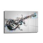 Rock Ruhu: Dinamik Gitar Splash Art Temperli Cam Tablo, patlayıcı renk sıçramaları ve dinamik fırça darbeleriyle birleşen elektro gitar siluetini gösteren modern ve sanatsal bir duvar dekorasyonudur.