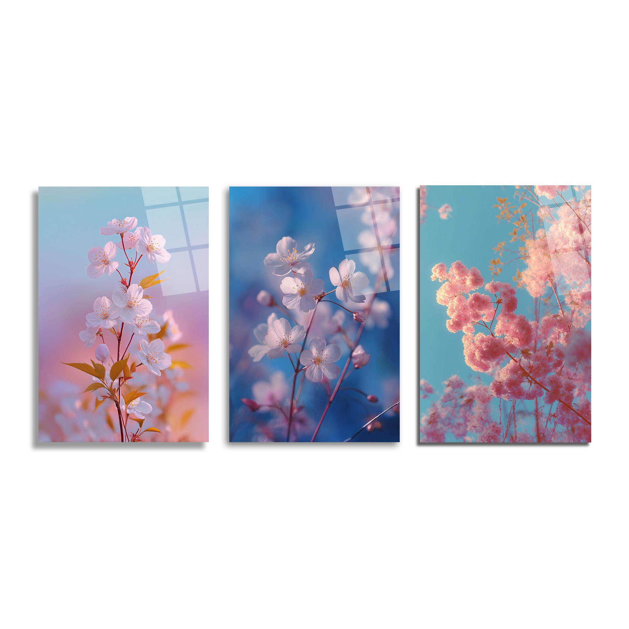 Üç parçalı, temperli camdan yapılmış, pembe ve beyaz bahar çiçeklerinin pastel tonlarda (açık mavi, mor, pembe) arka planlar üzerinde yer aldığı cam tablo seti. Sanatsal ve huzurlu bir çiçek kompozisyonu.