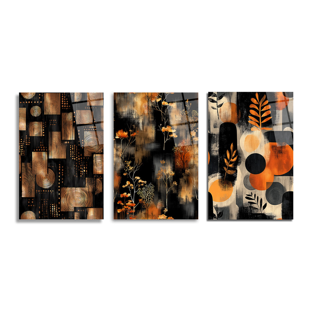 Siyah, bronz ve turuncu renklerde, soyut geometrik desenler, ince dallı bitki motifleri ve dairesel formlar içeren modern üçlü cam tablo seti. Her panel farklı bir soyut kompozisyon sunar.