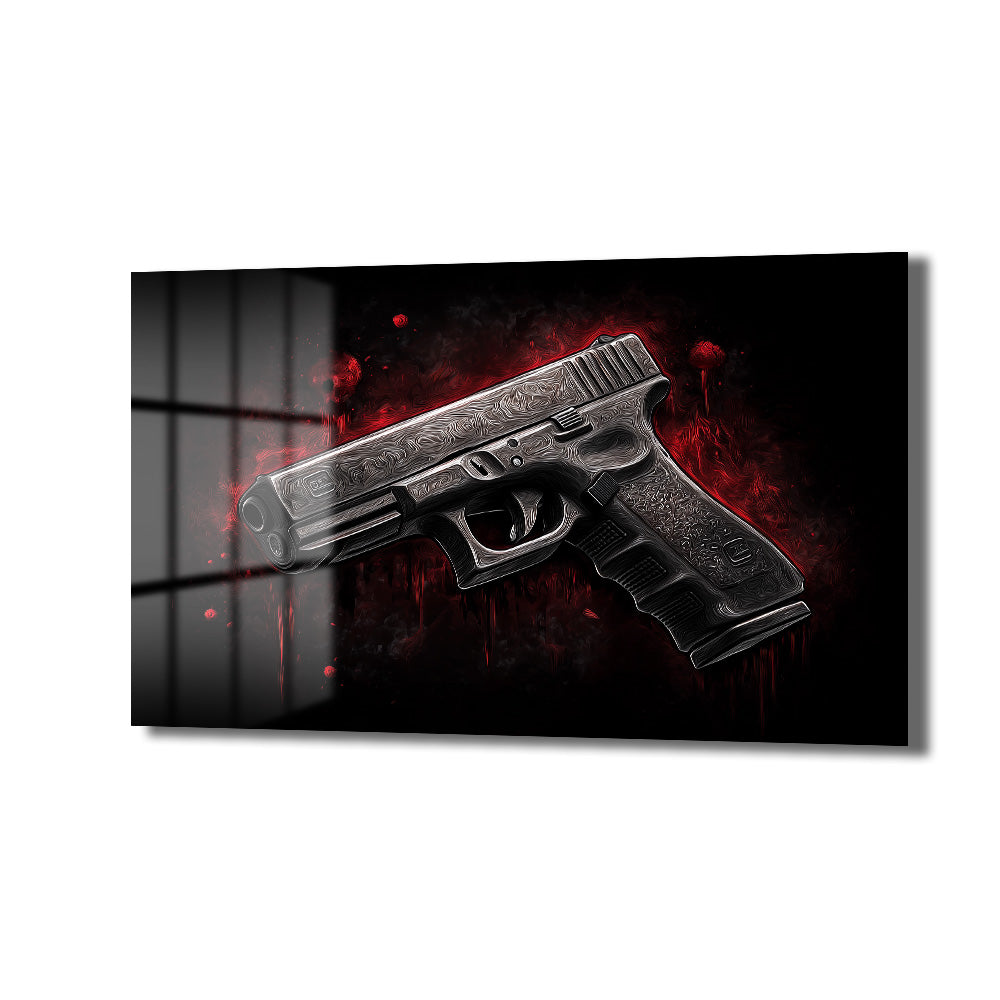 Koyu siyah arka plan üzerinde kızıl patlamalar ve damlalarla çevrili, detaylı işlemeli siyah renkli bir silahın (Glock tarzı tabanca) gösterildiği parlak yüzey temperli cam tablo, modern ve güçlü bir duvar dekorasyonu.