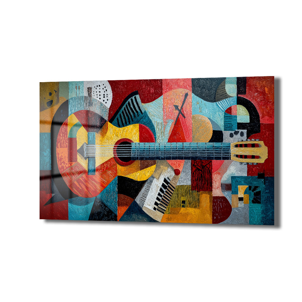 Canlı renklerde, kübist tarzda soyut bir gitar resmi içeren dikdörtgen bir cam tablo. Gitarın gövdesi ve sapı, kırmızı, sarı, mavi, turuncu ve siyah gibi birçok geometrik şekil ve dokuyla çevrili olarak betimlenmiştir. Arka planda da benzer soyut desenler ve renk blokları bulunmaktadır.
