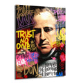 Siyah zemin üzerine, The Godfather filminden Vito Corleone'nin graffiti tarzında işlenmiş portresi. Etrafında renkli sprey boya efektleri ve 'TRUST NO ONE', 'FAMILY FIRST', 'KING', 'DON' gibi yazılar bulunuyor. Modern ve cesur bir sanat eseri.