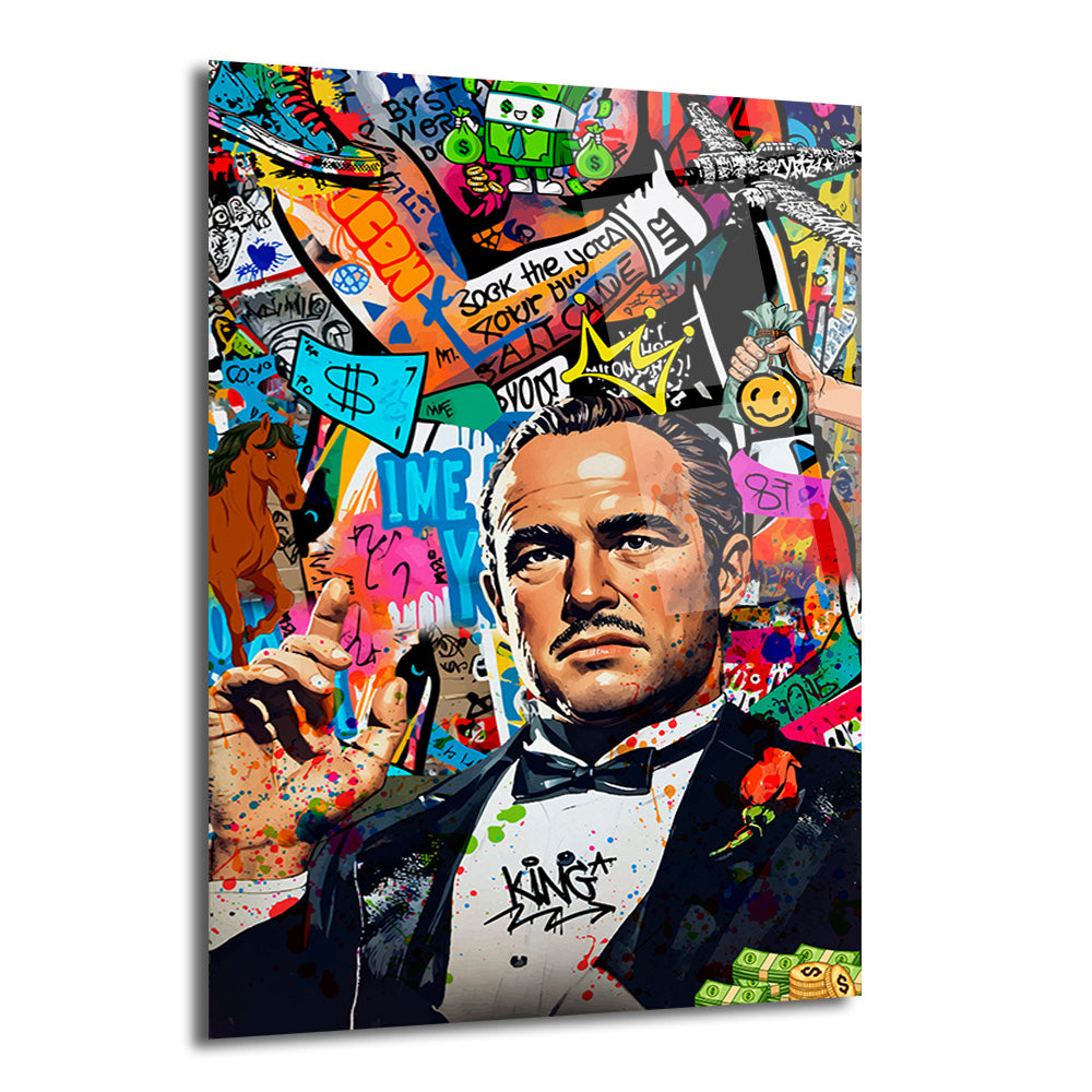 Marlon Brando'nun Vito Corleone karakterini canlandırdığı, arkasında rengarenk graffiti, sokak sanatı öğeleri, dolar işaretleri, at figürü, taç ve boya sıçramaları bulunan, pop art tarzı cam tablo.