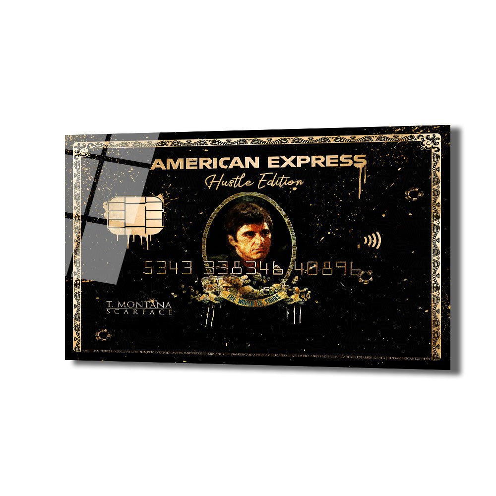 Siyah ve altın renklerde, Scarface filminden Tony Montana'nın görseliyle tasarlanmış, American Express kredi kartı temalı, üzerinde 'Hustle Edition' ve 'The World Is Yours' yazan parlak cam tablo.