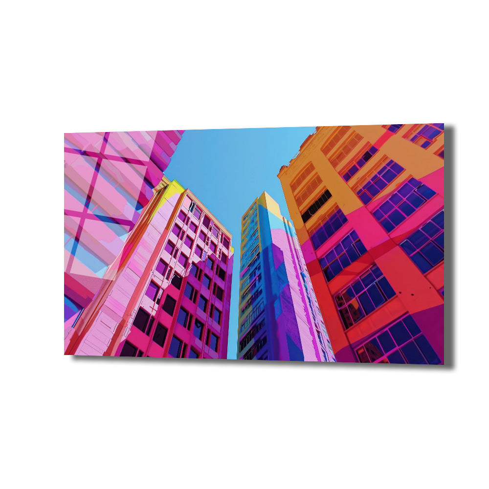Dinamik açıyla çekilmiş, pembe, mor, turuncu ve mavi tonlarında modern gökdelenlerin soyut ve geometrik desenlerle zenginleştirilmiş şehir manzarası cam tablo.