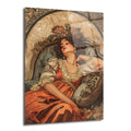 Art Nouveau tarzında, turuncu elbiseli, yeşil kadife koltukta uzanmış, gözleri kapalı zarif bir kadının vintage görünümlü cam tablo resmi. Arka planda çiçek ve kıvrımlı desenler mevcut.