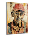 Kırmızı şapka ve kirli sakallı yaşlı bir adamın suluboya tekniğinde yapılmış, düşünceli ifadesini yansıtan yakın plan cam portre tablosu.