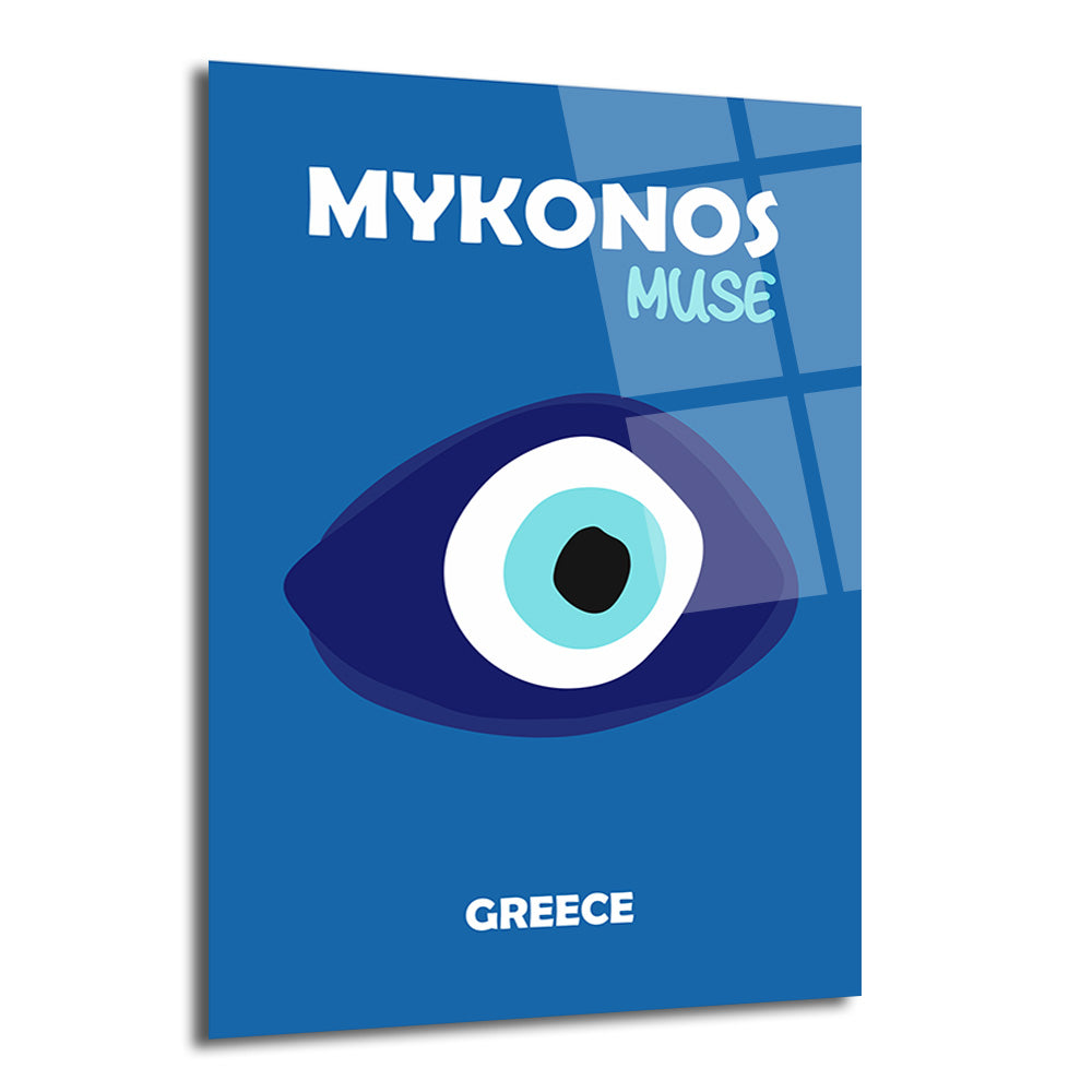 Koyu mavi zemin üzerinde, ortasında büyük, stilize bir nazar boncuğu figürü ve üstte 'MYKONOS MUSE', altta 'GREECE' yazısı bulunan parlak cam duvar sanatı.