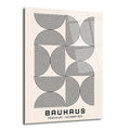 Açık bej zemin üzerinde siyah, konsantrik yarı çemberlerden oluşan tekrarlayan geometrik desenli, Bauhaus stilinde bir cam tablo. Altta 'BAUHAUS FRANKFURT - OKTOBAR 1923' yazısı bulunuyor.