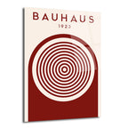 Krem rengi zeminde, üstte 'BAUHAUS 1923' yazısı ve altta kahverengi yarı daire içinde iç içe geçmiş dairelerden oluşan minimalist bir tasarım cam tablo.
