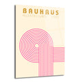 Bej zemine sahip, Bauhaus Ausstellung 1923 yazılı, pembe renkli geometrik çizgilerle stilize edilmiş modern bir cam tablo.
