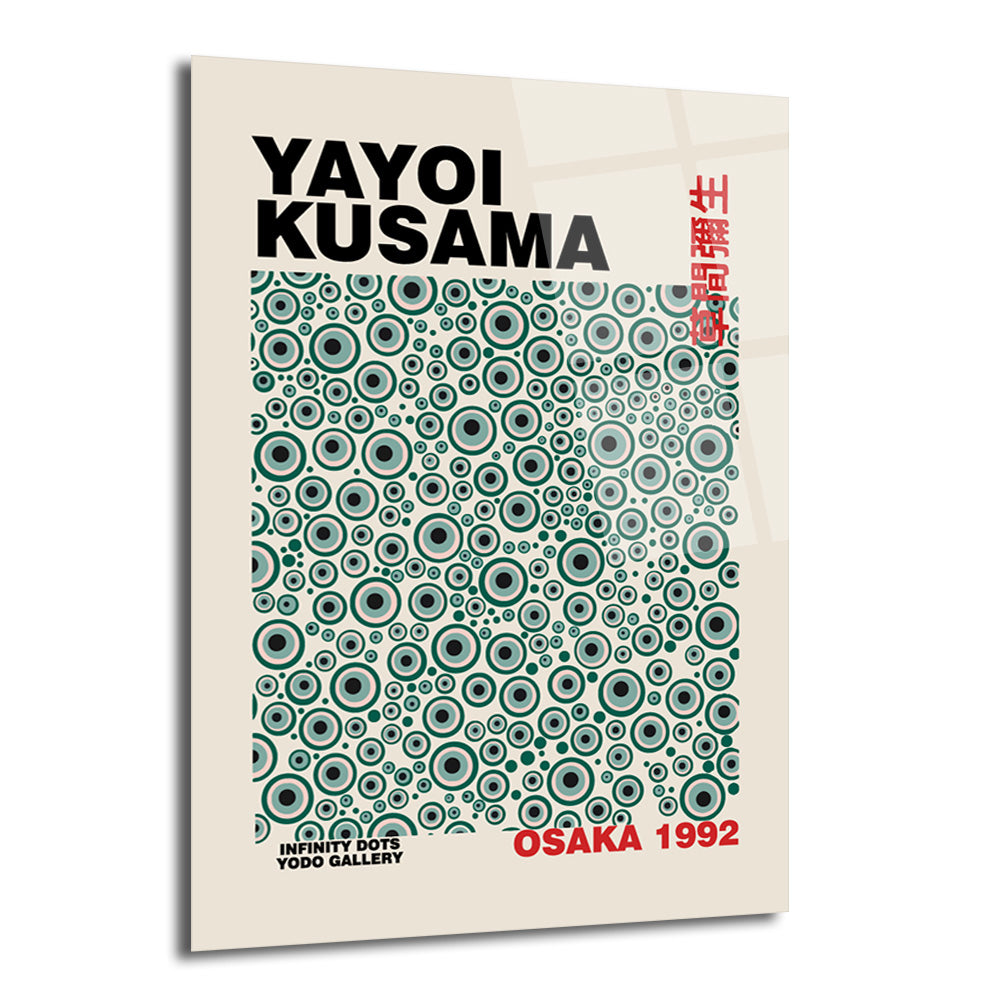 Yayoi Kusama'nın Sonsuzluk Noktaları serisinden, bej zemin üzerinde farklı boyutlarda teal, gri ve siyah konsantrik daire desenlerinin yer aldığı modern bir cam tablo. Sol üstte "YAYOI KUSAMA", sol altta "INFINITY DOTS YODO GALLERY" ve sağ altta "OSAKA 1992" yazıları bulunuyor.