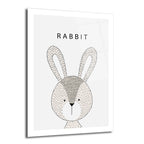 Beyaz arka plan üzerinde siyah ve bej tonlarında, noktalı çizim tekniğiyle yapılmış minimalist tavşan başı illüstrasyonu ve üstünde 'RABBIT' yazısı bulunan cam tablo.