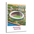 Adelaide, Avustralya'daki Adelaide Oval Stadyumu'nun kuşbakışı çizimi. Yeşil saha, beyaz çatı, çevresindeki ağaçlık alanlar, nehir ve şehir silüeti canlı renklerle tasvir edilmiştir. Resmin altında "Adelaide, Australia" yazısı yer almaktadır.