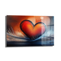 Aşkın Dokunuşu: Kalpli Modern Dekoratif Cam Tablo, narin tüyler üzerinde canlı kırmızı ve turuncu telkari detaylı bir kalbi betimleyen, arka planda sıcak bokeh ışıkları olan romantik ve modern bir cam duvar sanatı.