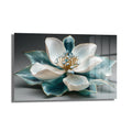 Aqua Lotus Zarafeti: Altın Detaylı Modern Cam Tablo, beyaz ve turkuaz tonlarında, altın çizgilerle süslenmiş lotus çiçeği motifine sahip, ortasında pırıltılı açık mavi taş detayı bulunan, modern ve zarif bir temperli cam duvar tablosu.
